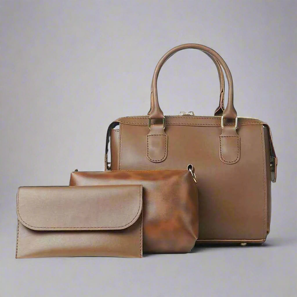 A set of three black handbags, including a shoulder tote, crossbody, and mini clutch, with a consistent design and texture.